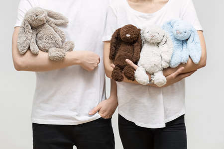 Couple with toy rabbitsの写真素材