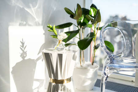 White-golden stand with flowerの写真素材