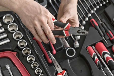 Open toolbox and male handsの写真素材