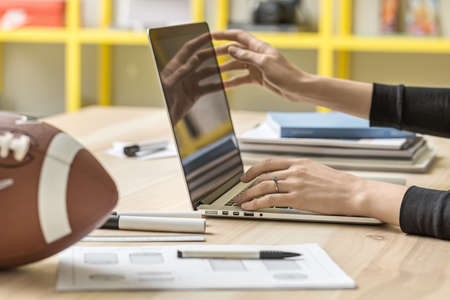 Woman using laptop in officeの写真素材