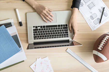 Woman using laptop in officeの写真素材