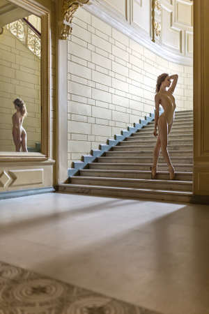 Ballerina posing in interiorの写真素材
