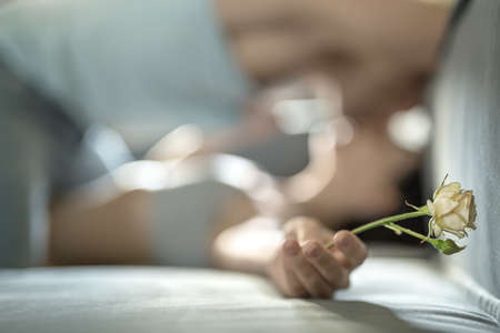 Sexy couple on sofaの写真素材