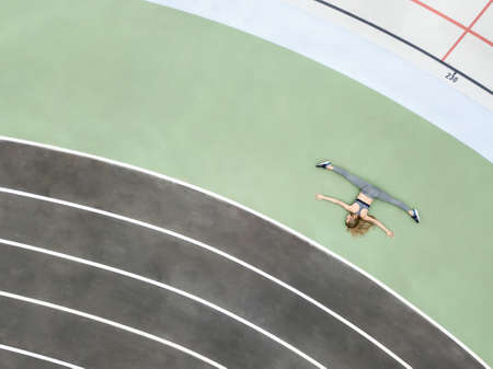 Sportive girl posing outdoorsの写真素材