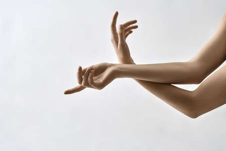 Closeup photo of female armsの写真素材