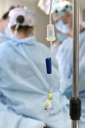 Doctors in operating roomの写真素材