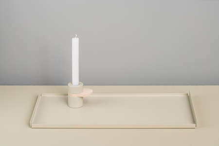 Steel beige support and candlestickの写真素材