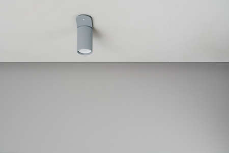 Metal gray lamp on ceilingの写真素材