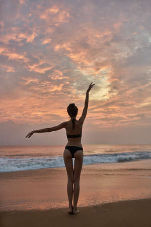 Girl posing on beachの写真素材