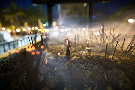 Aroma sticks inside buddhist templeの写真素材