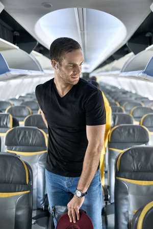 Handsome guy in airplaneの写真素材