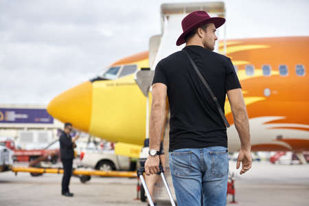 Young guy in airportの写真素材