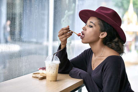 Beautiful girl in cafeの写真素材