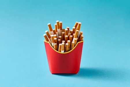 Many cigarettes in red cartonの写真素材