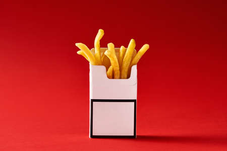 Fries inside cigarette packの写真素材
