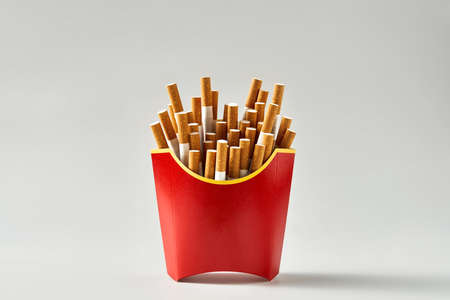 Many cigarettes in red cartonの写真素材