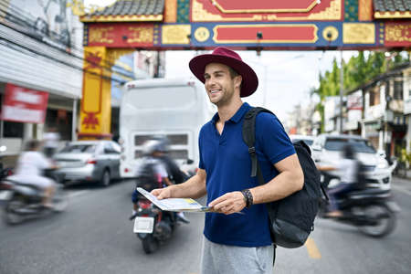 Traveler on asian city street. Daylight shooting.の写真素材