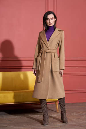 Model posing in studio in trendy clothesの写真素材