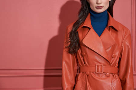 Model posing in studio in trendy clothesの写真素材