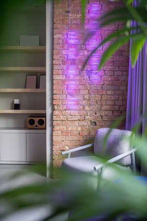 Stylish office in loft style with gray and brick wallsの写真素材
