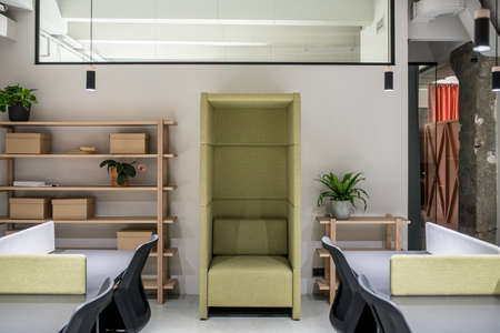 Stylish office in loft style with gray wallsの写真素材