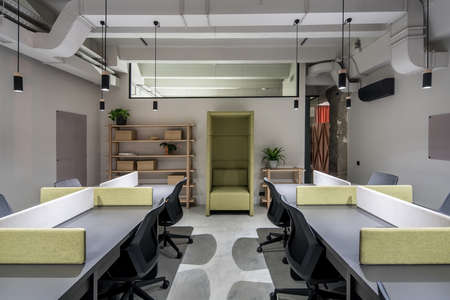 Nice office in loft style with gray wallsの写真素材