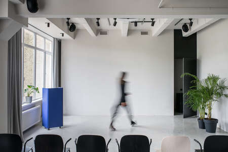 Stylish interior in loft style with gray wallsの写真素材