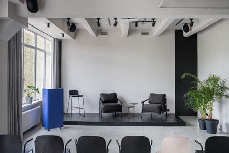 Stylish interior in loft style with gray wallsの写真素材
