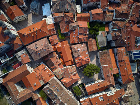Old buildings with red-orange roofs in Kotor in Montenegroの写真素材