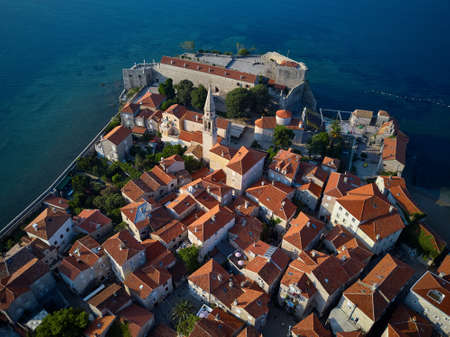 Old town with churches and fortifications in Budva in Montenegroの写真素材