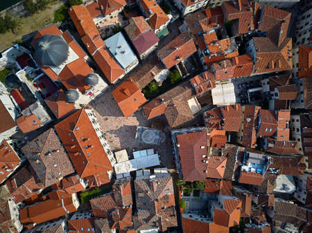 Old buildings with red-orange roofs in Kotor in Montenegroの写真素材