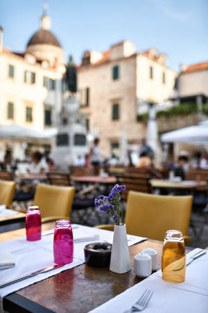Open cafe in old town of Dubrovnik in Croatiaの写真素材
