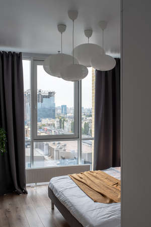 Great bedroom in modern style with parquet on floorの写真素材