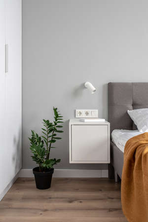 Great bedroom in modern style with light wallsの写真素材