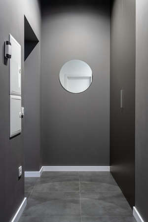 Great luminous interior in modern style with gray wallsの写真素材
