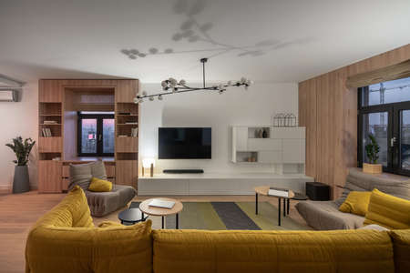 Stylish interior in modern style with light walls and luminous lampの写真素材