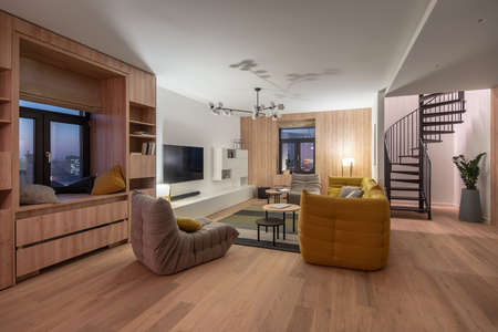 Stylish interior in modern style with light walls and luminous lampの写真素材