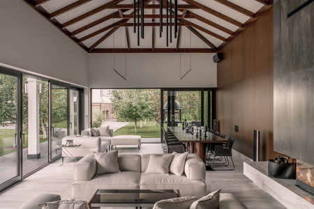 Modern interior with light walls and wooden beamsの写真素材