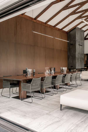 Modern interior with different walls and wooden beamsの写真素材