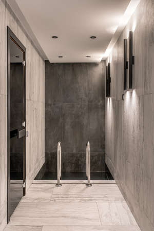 Small pool inside modern interior with luminous lampsの写真素材