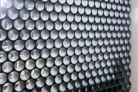Gray partition made of the short pipesの写真素材