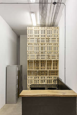 Interior in a loft style with white walls in the coworking.の写真素材