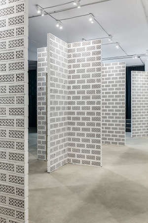 Several white brick partitions in the office in a loft styleの写真素材