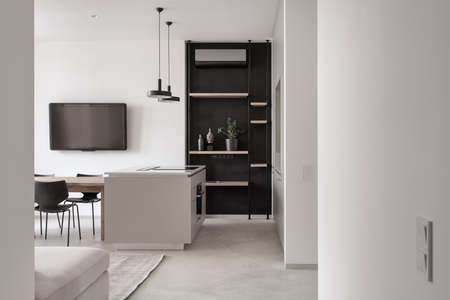 Kitchen in modern style with light walls and gray floorの写真素材