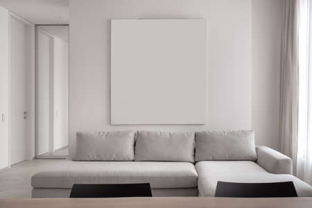 Stylish modern interior with white walls and gray floorの写真素材