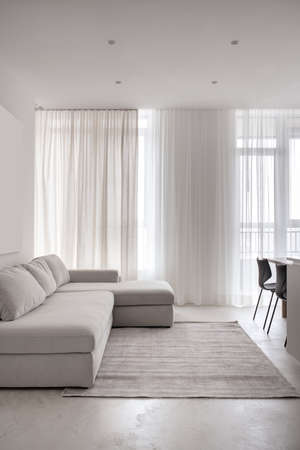 Stylish modern interior with light walls and gray floorの写真素材