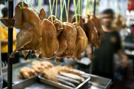 Street market showcase with poultry in Thailandの写真素材
