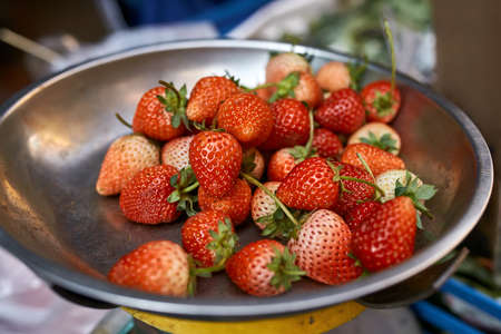 Tasty strawberries on street market in Thailandの写真素材