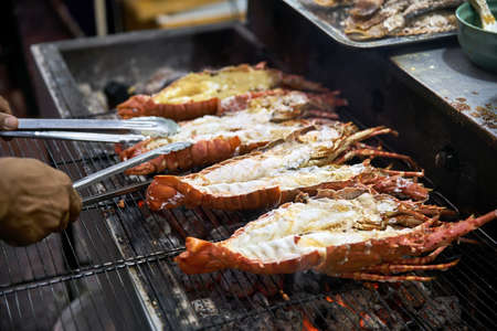 Grilled lobsters on street food market in Thailandの写真素材