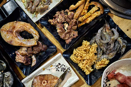 Different vietnamese seafood and meat and vegetablesの写真素材